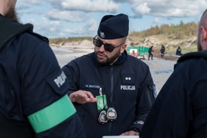 Konkurencja "Bieg pościgowy z elementami właściwymi dla specyfiki służby patrolowej"